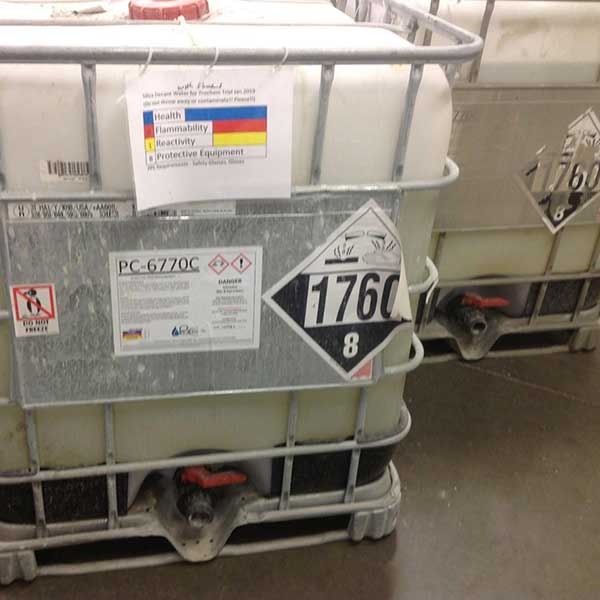 hazardous chemical container with labels